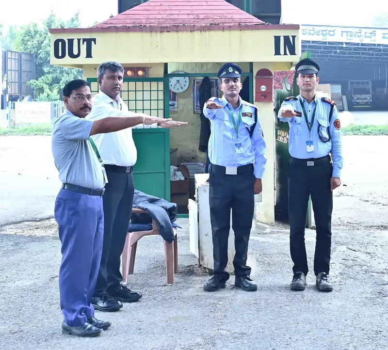 Poorvika FMS guards at a client gate sentry booth